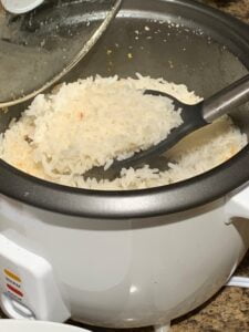 Cooked rice on a rice cooker