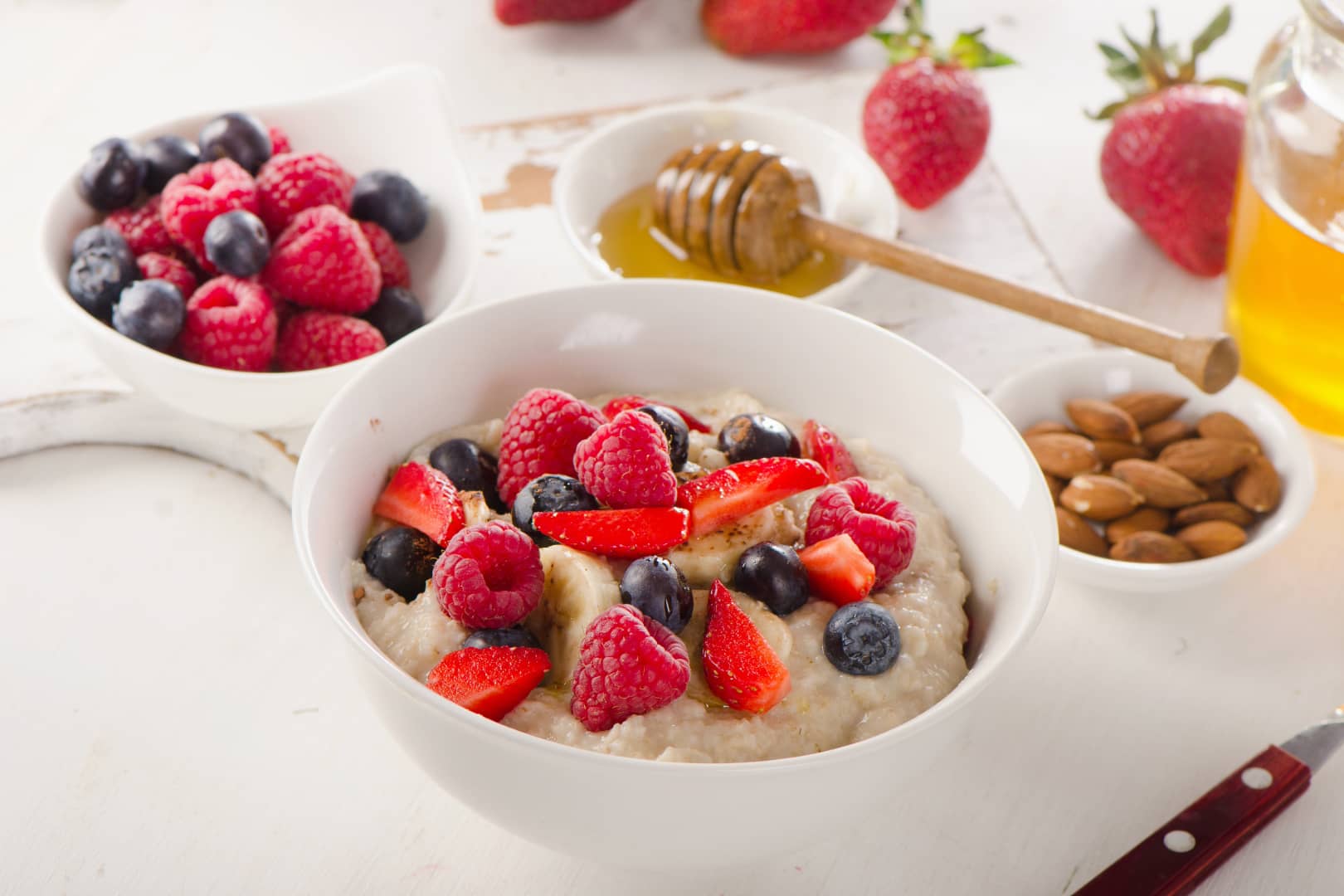 an example of a pollotarian diet dish of oatmeal with fruits and honey