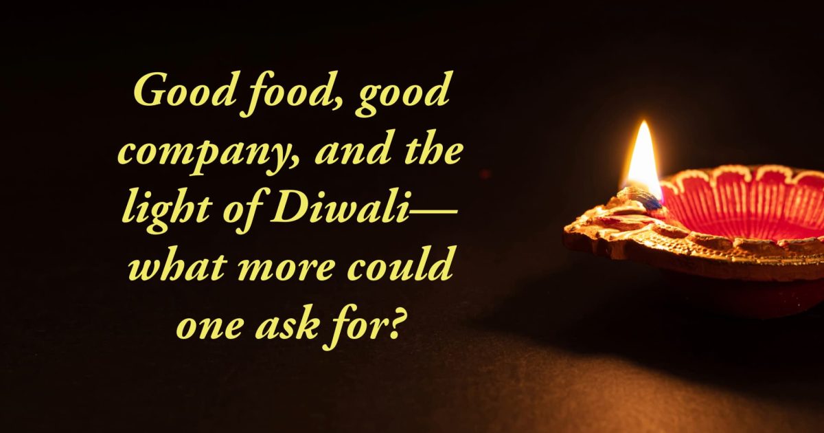 dark image lit with one candle light and words that read good food good company and the light of Diwali what more could one ask for?
